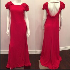 Red shoulder ruffle gown